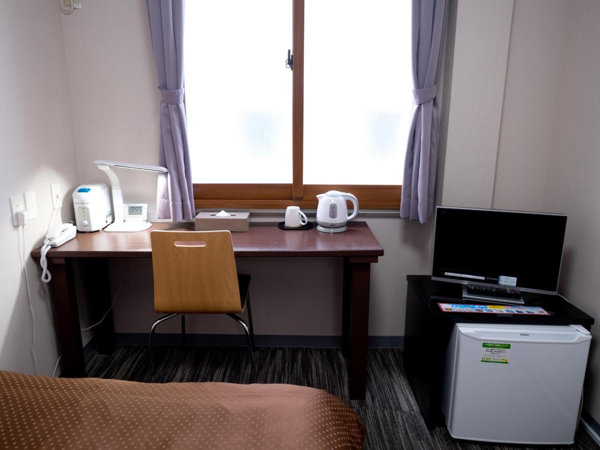 Matsuyama New Grand Hotel Room photo