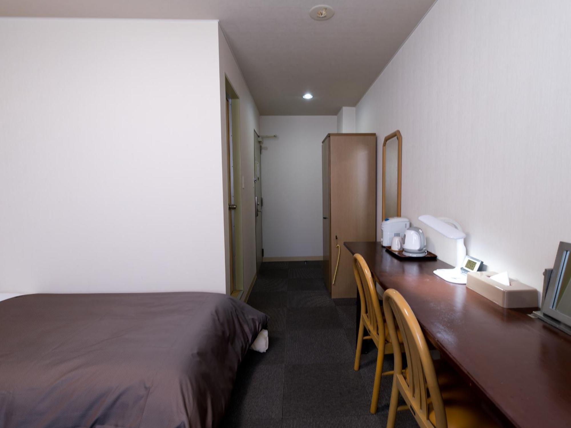 Matsuyama New Grand Hotel Room photo